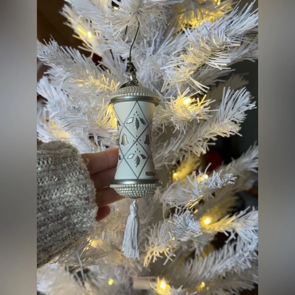 2000 Hallmark “ Our First Christmas”  White and Silver Ornament with Tassel